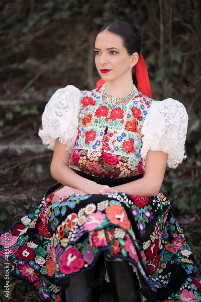 Young beautiful slovak woman in traditional dress. Slovak folklore Young beautiful slovak woman in traditional dress. Slovak folklore