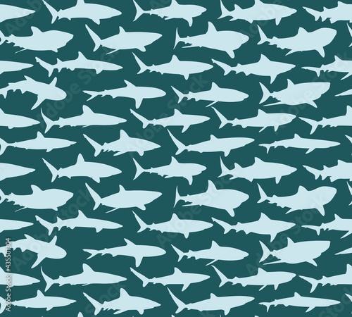 The seamless blue background with sharks.