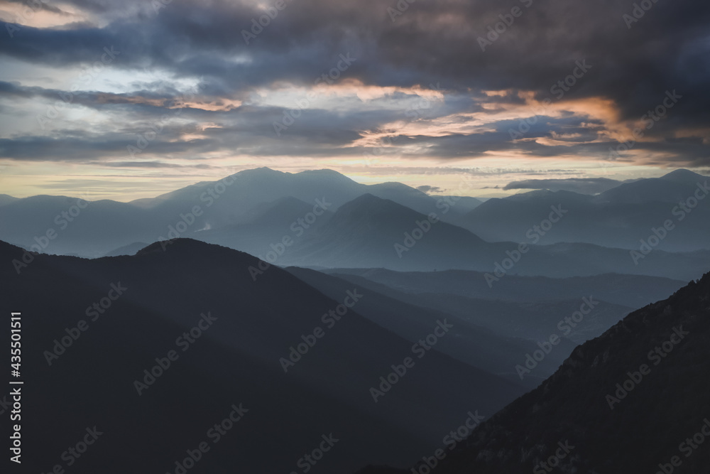 Beautiful Mountain landscape of Irpinia in southern Italy near Avellino. Misty foggy mountain landscape. Cloudy and dramatic sky