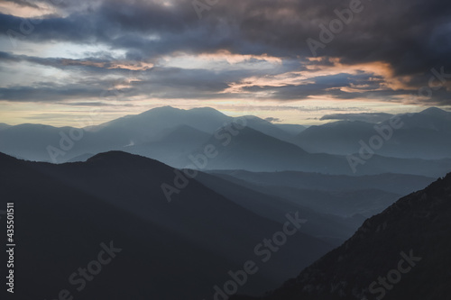 Beautiful Mountain landscape of Irpinia in southern Italy near Avellino. Misty foggy mountain landscape. Cloudy and dramatic sky