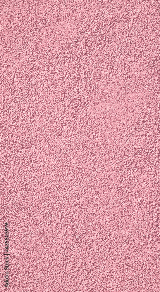 Texture of a plasterwork painted in pink used as an exterior coating on a building