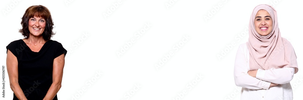 Two people in front of a white background with a white space in between
Two people in front of a white background with a white space in between