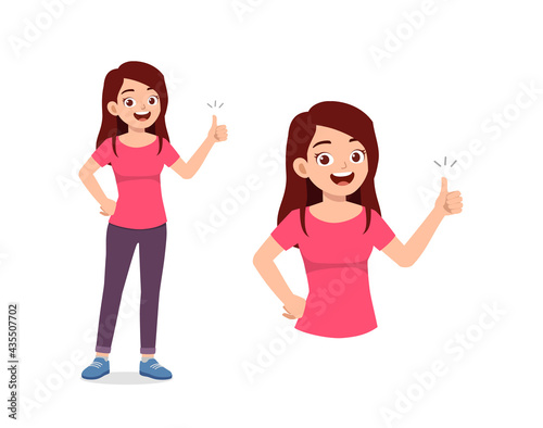 young good looking woman doing thumb up pose