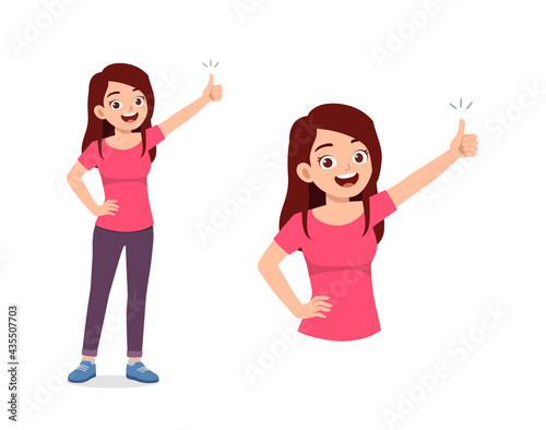 young good looking woman doing thumb up pose
