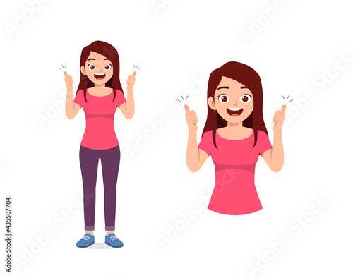 young good looking woman doing thumb up pose