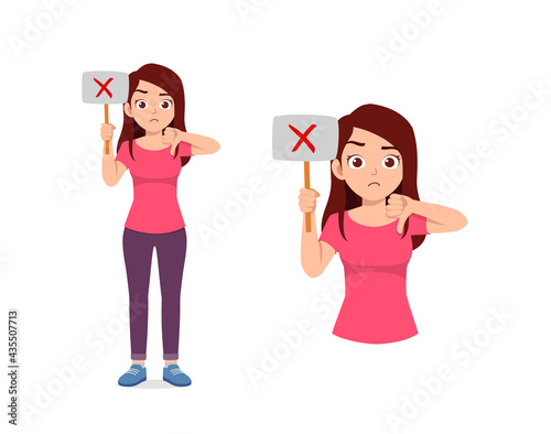 young good looking woman holding board said no