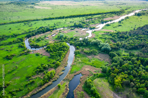 Aerial view to spring meadow and Seversky Donets river
