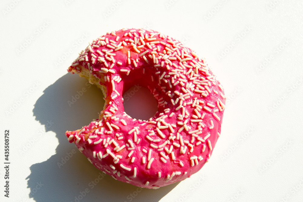 donut with sprinkles isolated on white donut with sprinkles isolated on white