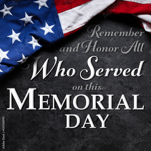 US American flag over Remember and Honor All Who Served on this Memorial Day Text. USA national holiday.