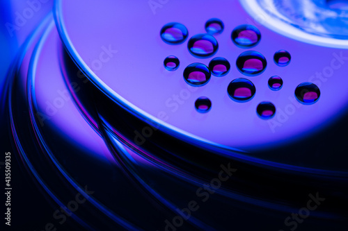 water drops on a blue background in the form of abstraction, blue background, background with circles