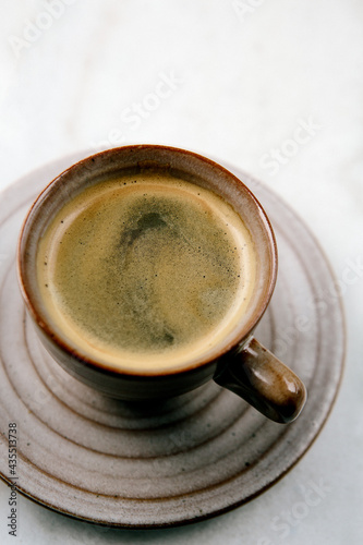 Espresso in cup with saucer 