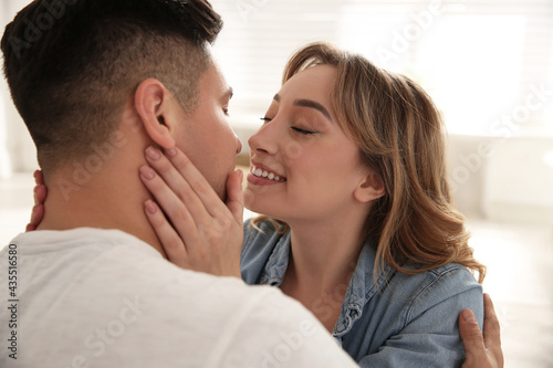 Lovely couple enjoying time together at home