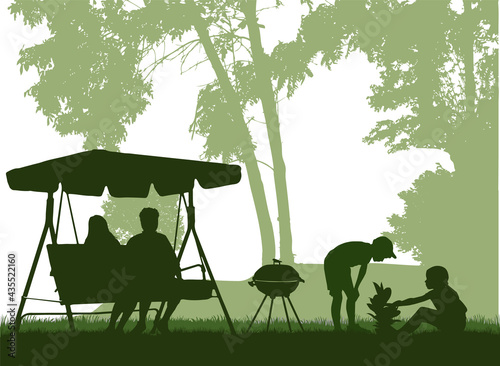 Barbeque in the garden, family spends their free time.