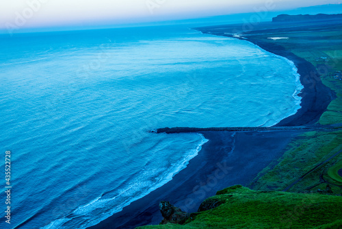 Black sand beach, Reynisfjara shore near the village Vik, atlantic ocean, Iceland