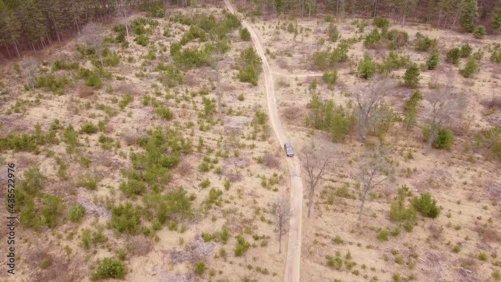Off-Road Driving Through Remote Area Of Leota In Michigan. - Aerial Tracking Shot Off-Road Driving Through Remote Area Of Leota In Michigan. - Aerial Tracking Shot