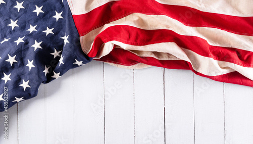 Happy Independence day: 4th of July, American flag on white wooden background © Siam