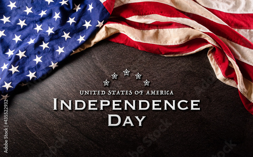 Valokuvatapetti Happy Independence day: 4th of July, American flag on dark stone background with the text