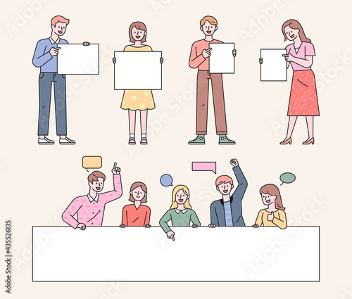 People are standing holding a white board. People are making comments behind a large white banner. flat design style minimal vector illustration.