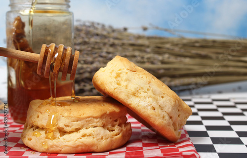 Honey and Wheat Biscuits Close up With Dried Laveder in Background photo