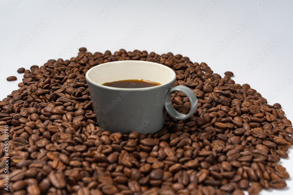 Coffee beans and coffee on a white background Coffee beans and coffee on a white background
