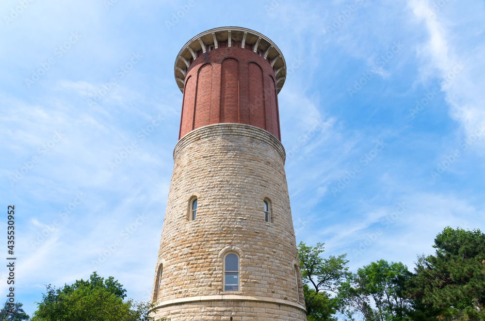 landmark water tower building in western springs