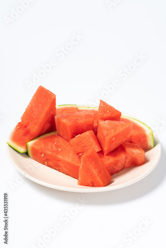 The sliced watermelon is on the plate