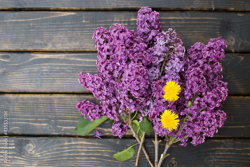lilac and dandelion on boards