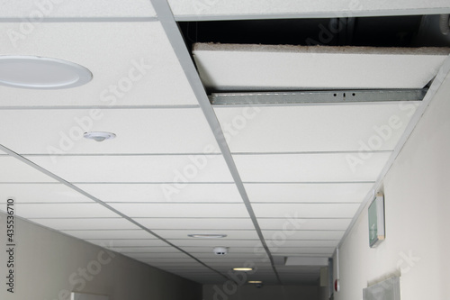 white false ceiling with open hole