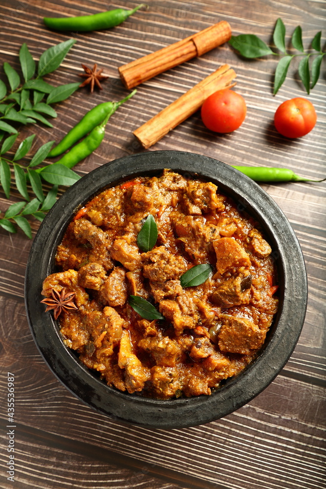 Traditional cooking Indian mutton curry cooked in clay pot .earthen ware, pottery Stock Photo