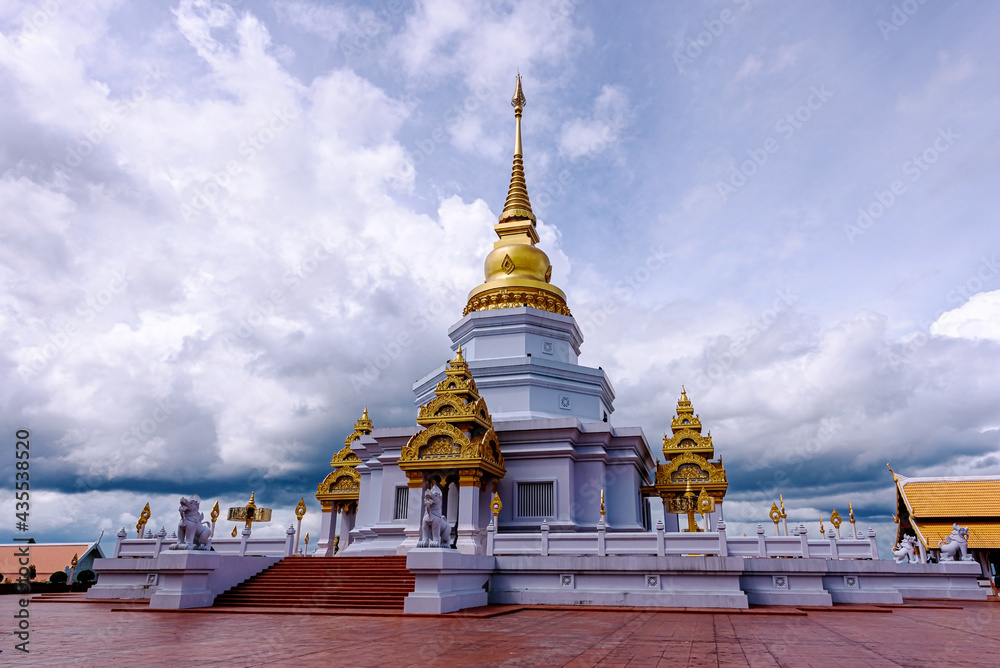 Fototapeta premium Phra Maha Chedi Thepnimittham At Phra That Santitham Temple in Village Mae Salong Nok, Chiang Rai province, Thailand.