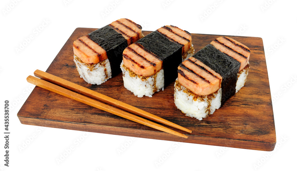 Spam musubi with grilled pork luncheon meat and sushi rice wrapped with roasted seaweed nori isolated on a white background - obrazy, fototapety, plakaty 