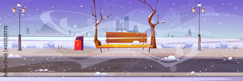 Winter city park with wooden bench, bare trees, blizzard and snowdrifts around, lanterns, bin and town buildings skyline. Urban empty public garden landscape, snow fall under dull sky Vector cartoon