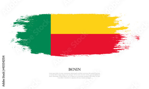 Benin flag brush concept. Flag of Benin grunge style banner background