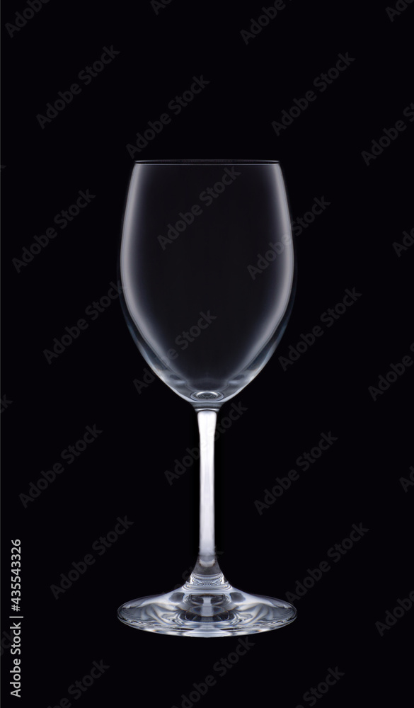 Empty wine glass isolated on dark background. Studio Empty wine glass isolated on dark background. Studio