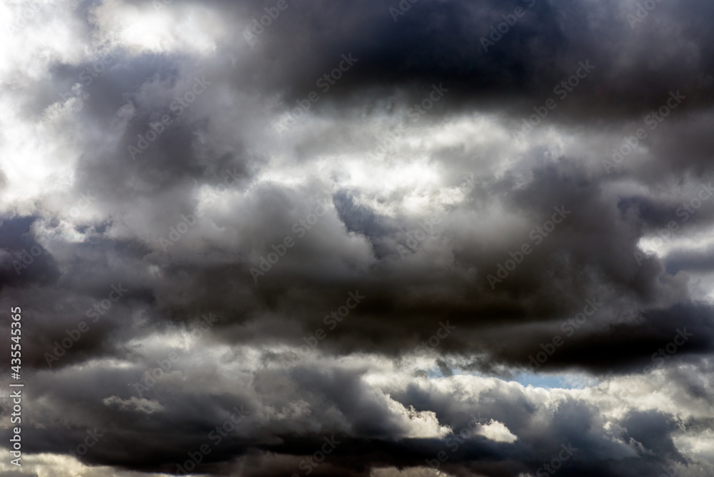 Dramatic blue sky with white clouds background.Toned. Dramatic blue sky with white clouds background.Toned.
