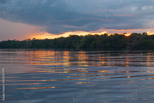 Nice postcard a sunset or sunrise in the Amazon river of South America photo