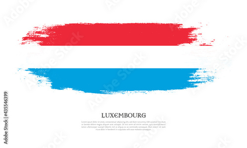 Luxembourg flag brush concept. Flag of Luxembourg grunge style banner background