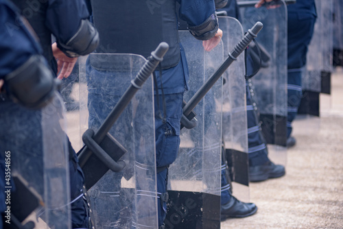Fototapeta Naklejka Na Ścianę i Meble -  Riot police practice shields and baton