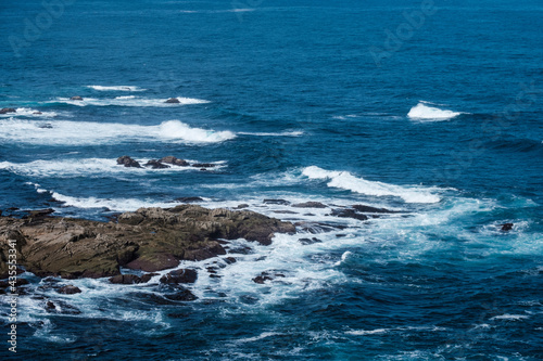 Detail of the coast of Galicia  near the Punta Nariga Lighthouse  in Malpica de Berganti  os  in the province of La Coru  a   Spain .