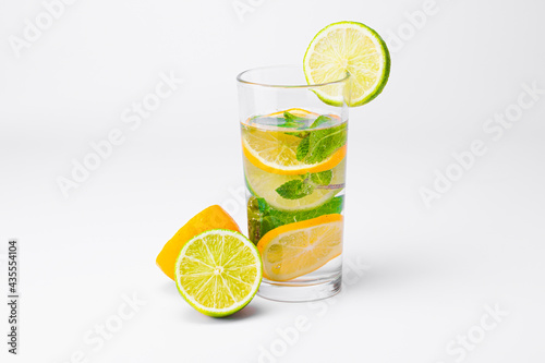 Cocktail isolated on white background. Lemon, lime and mint cocktail.