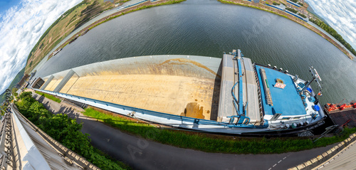 empty cargo ship at the pier in Bingen with panoramic view of river Rhine photo