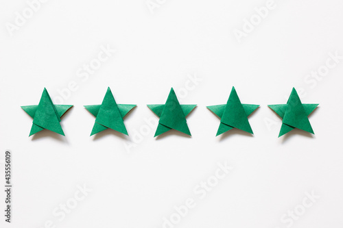 Obraz na płótnie Green five stars quality rating on white background. top view w salonie