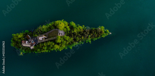 Island on Lauerzersee in Switzerland. Lake in the Swiss Alps.