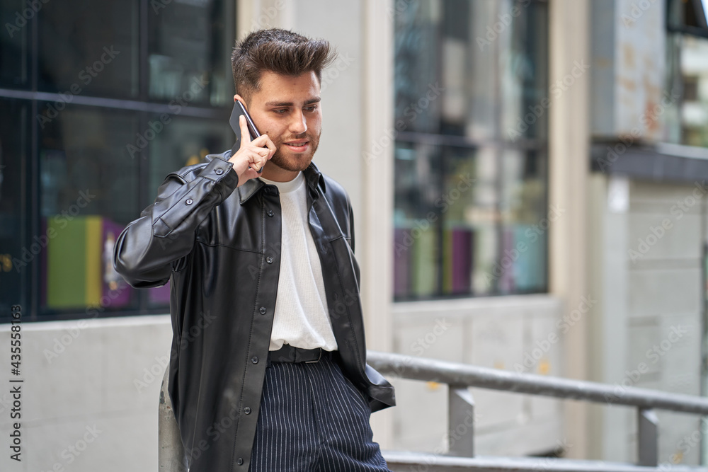 caucasian man with beard talking with smartphone caucasian man with beard talking with smartphone