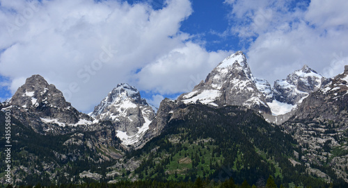 the magnificent  south tetotn, middle teton, and garnd teton peaks  in summer in grand teton national park, wyoming  photo