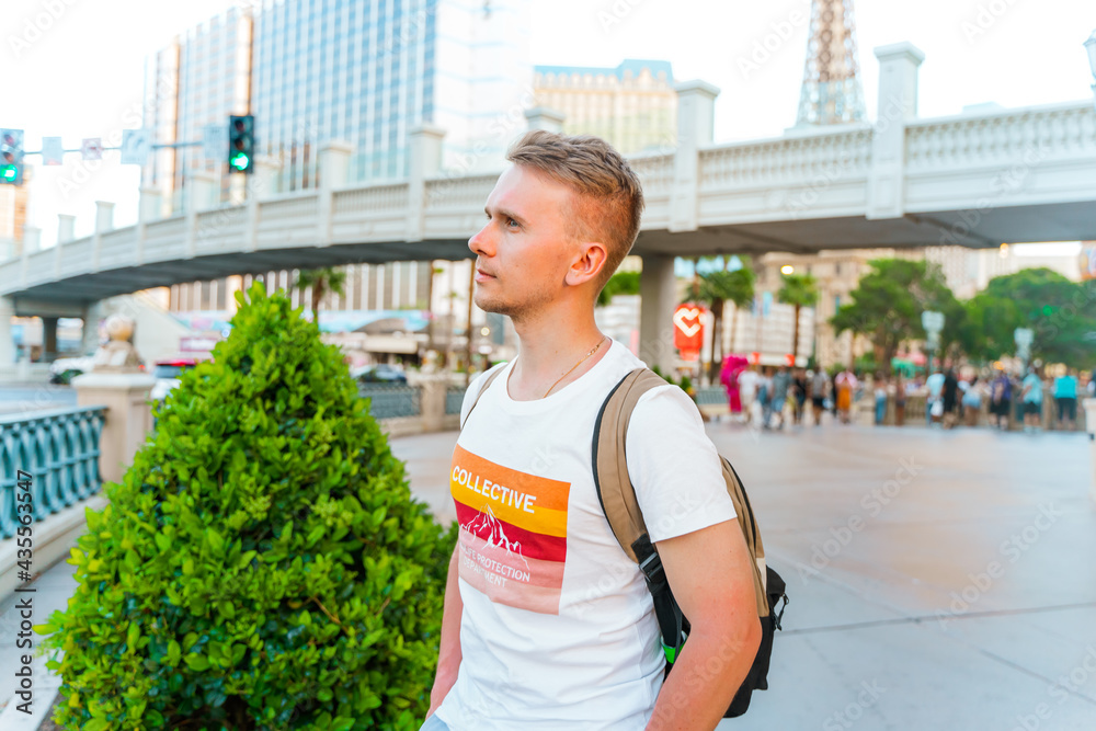 A young man walks the streets of Las Vegas. Las Vegas, USA - 18 Apr 2021