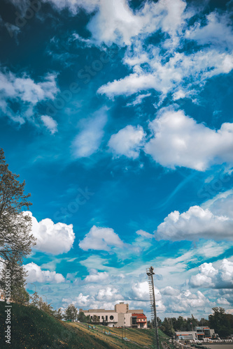 surreal clouds like from cartoons covered the northern city with a dome