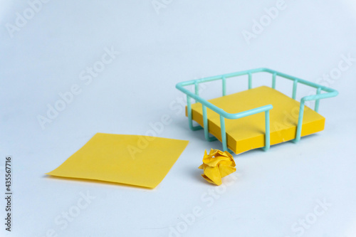 empty yellow sticky note and Crumpled note on white background with soft shadow.