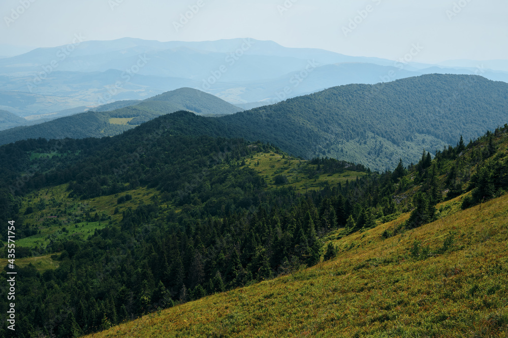 Obraz premium Beautiful natural landscape in the mountains. Picturesque view of the valley. Travel and exploration. Amazing natural scenery. Tourism and travel concept image, fresh and relaxing image of nature