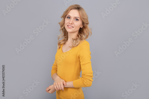 cheerful blonde beauty woman with curly hair, female beauty